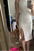 Did not like the material or quality of this dress. Was also too small. The back area is weird and sides don't form to your body. - Jessica E.