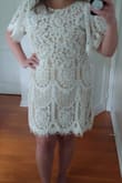 This dress is perfect! It has a nice fit that shows off your figure but doesn't cling to your body. The length is just right, which is hard to find for my height. - Heather M.