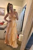 Wore this to my rehearsal dinner and got a ton of compliments!! I'm a true medium and the medium was a tad snug around the waist (likely because the fabric does not stretch) but still fit and felt comfortable enough! - Erica B.