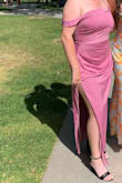 This dress is very flattering in the bodice and around the midriff with the ruching. The off-shoulder look and side split were perfect. The color is so pretty. The large fit perfectly. - Sarah P.
