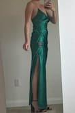 The color is really that bright and pretty. The fabric is silky, but thicker. Stretchy straps to fit all chest types. Very flattering and the side ruching is super cute. - Melissa E.