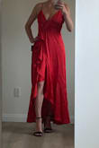 Perfect fit, the high-low is super flattering so you can always see some leg.  The front is pretty deep so can't wear a bra, might stitch up a little so I can. - Melissa E.