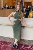 Love this dress! True to size. Great material. I wore to the opera. I felt
very sassy. Lol. - Marci M.