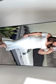 This dress is great. Fabric is thick which is nice since it's a white dress. It's form fitting and is somewhat long but I am not tall. I bought this for my engagement party and it was great! - Nylisa V.