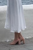 I love them! The bow part is snug and makes it comfortable for walking. I wore the blush color with a white dress for a photo shoot. - Angie K.