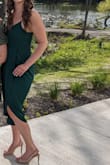 Wore this to a friend's wedding - material felt nice, had to be a little careful of the breeze or how you sit with the slit but I think it was the right amount of showing off a little leg/ being sexy without being inappropriate. No alterations needed, the adjustable straps were nice, just had to iron/ steam it before wearing. - Rebecca S.