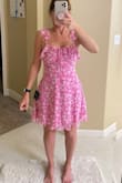 This dress is pretty but unfortunately did not look good on me. I found the top portion to fit but the bottom half was very large and unflattering. - Angela H.