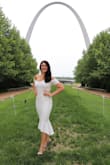 This dress was perfect for graduation. I wore a size medium, and it was true to size and tall girl approved. It is form fitting, so I recommend wearing shape wear underneath. Dress includes a slip underneath and a grip strip along the bra line so it stays in place. - Denise N.
