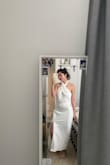 The dress overall is very beautiful. It's thick and well covered. It's a little loose on the top area but it's an easy adjustment IMO. Will be wearing this for my bachelorette dinner! - Linh N.