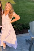 I wore this dress as a wedding guest and it was perfect for the occasion! I filled the sizing chart and the size I ordered was a perfect fit. The material is high quality and light & airy! The only downside was that the neckline plunges a little low, so if you have bigger boobs, have a safety pin ready so the girls don't pop out lol. All in all I loved this dress! - Ashley D.