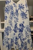 Loved the dress but I washed it on cold delicate cycle and the blue bled into the white. It says not to bleach but I may try that next. It also shrunk a little and I didn't put it in the dryer. - Johanna B.