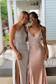 I bought this dress for my daughter for prom. I knew she would like the unique neckline. It was super flattering on her and she said it was very comfy. She got lots of compliments on her dress! - Kristin M.