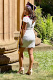 Such a beautiful dress! Perfect for graduation! A little hard to sit on bc of the sequins and a little tight on the shoulders but nothing you can't ignore. - Xunaxi L.