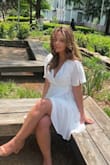 I wore this dress for graduation and love it! It fit true to size. The dress was a little see-through in the back. - Airiana M.