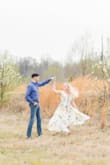 This was absolutely perfect for our spring engagement photos! The only downside was I had to safety pin the top as it's extremely low cut and open, but it still ended up looking great in photos. - Amilyn T.