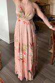 I ordered this and another dress for a formal wedding. I liked this one a lot, but I have fair skin with pink undertones so I was almost the same color as the dress! My sister has more olive undertones and decided to wear this to the wedding. It looked gorgeous on her! If I had a tan I would have wanted to wear this one. Love the adjustable straps, we did use a safety pin to clip the front together so that her bra wouldnt show. - Kathleen C.