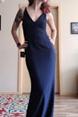The overall fit of this dress is perfect. It's a comfortable material and beautiful color. It's quite a long dress, but that's easily tailored to make it match my heal that I'll be wearing. - Carissa F.