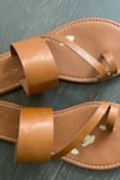 Looks a little cheaply made. I've only worn them a few times and they're already falling apart. I wouldn't buy again. - Dani P.