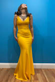 I bought this dress for my 1st gala and it was the perfect choice! I received so many compliments on the color and style. It is form fitting and the material is thick. The dress is quite long so I had it hemmed a few inches. - Mary L.