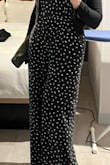 I looked a long time for the right style jumpsuit that would be flattering and appropriate for different occasions in a simple but fun pattern - and this is definitely it! It is super flattering, can be dressed up or worn for more casual occasions, and it's so fun! The leg length is super long even with heels so I did hem it. It was a bit roomy but I think a whole size down may be too small. I'd 100% recommend this! - Sara E.