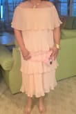 I usually wear bright colors but for this party I wanted something summery that would cover my meaty arms. This dress delivered! The color is very flattering and so is the design. - Jessica G.