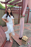 The fabric is amazing. It might look longer than how it looks in the pictures with the models but it's because I'm 5'0, also it was a little big in the shoulders and tight in waist but I'm petite with some curves so it's fine. I really loved it! It's so flattering. - Rosibel V.