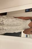 Bought this dress for my upcoming rehearsal dinner and it's stunning. I usually wear an xs for Lulus and this was true to size. I'm shorter so this was definitely more floor length for me but will be perfect with heels. I love the strappy back as well. The dress does flare a bit more at the bottom but I think it makes it look more unique! - Alyssa P.