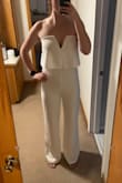 This jumpsuit is going to be perfect for either brunch at my bach party or maybe for my bridal shower. The material is thick but comfortable. Legs are very long like other reviews have mentioned which was surprising as most things are too short on me. - Megan B.