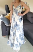 The dress is really good quality- has an extra layer not to see through. I think it fits easily to different body shapes with an adjustable waist part. I usually go for S or M but this dress is definitely S for me. I don't have a big chest, but with a supportive bra it still fits. The height is just right with a short high heel. I ordered it from the UK to wear for my best friend's wedding and definitely worth it! I chose standard shipping with something like extra $6 and it arrived in 5 working days. Loving this dress!! - Deniz T.