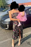 The dress is stunning to look at. The colors, flowers, and shape of it are gorgeous. But the quality is awful. I wore it once and not only did the fabric pull at everything, but it also ripped. Which made no sense bc it was loose in the bust. In fact, I was thinking of exchanging it for an XS, bc it was loose in the bust and the hips. Even before wearing it, there were issues. The fabric near the bust gathered and pulled. I'm a 34B, so I thought maybe I just didn't fill it out, but I don't think it's constructed correctly. I'd like to return it or something bc there's no reason a dress should look like this after one wear. - Roya N.
