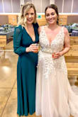 I wore it to my friend's wedding as a bridesmaid and got so many compliments! I'm tall and even with heels it was very long but I liked it. - Riquelle M.