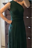 I bought this dress in a size small. The material is extremely soft but thick. Great quality for the price. The dress is a few inches too long for me but easy fix by wearing heels or adjusting the dress up in the waist. - Brigitte S.