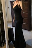 Great quality, thick, stretchy material. This dress runs a bit long for me even in 4-inch heels so will need to have it hemmed. - Brigitte S.