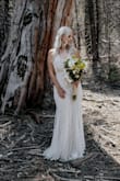 Wore this for my wedding. You literally cannot beat the price and it's even prettier in person. I'm a small person with a large bust so dresses can be challenging for me. Every part of this dress fit me perfectly. - Shannen L.