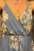 I sized down according to the reviews and the XS fits perfectly. I am usually in between a size small and a medium and while the small would work, the XS looked better. It is a little long but if you pair it with a heeled shoe it looks fine. 

One thing I noticed was a lack of quality control in the top of these dresses. I ordered this dress in the orange color as well and returned it because the flower pattern was barely present- it almost looks like they sewed the top of the dress inside out. This was also the case with the blue Small, but the dress I kept, the blue XSmall, had the pattern on the top and I love it. I have attached photos of both here. - Kristin C.