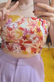 This was my plan B that I ordered along with my plan A top and it just won by so many points! The fit is really good and I can wear it with any bra. Fits perfectly with the pants I wanted to pair with (and my friends said it won't fit before the top arrived and after they said they were wrong). - Mor G.