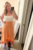 So cute and so flattering. It's a little long (I'm short) but just right with a small heel. Definitely get out your steamer (as you can see in the photo), but I love the color and fit and I'm going to wear it all summer! - Amanda D.
