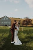 I bought this to wear for our elopement turned mini wedding and it was beyond perfect. It was gorgeous I got a million compliments and it is so comfortable! The quality and detail of the lace was super impressive. We wore matching vans and it was a little long but it still looked gorgeous, and I didn't mind walking around in the grass with it because it wasn't super overpriced. - Nicole K.
