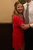The red is very vibrant and lace detailing and pattern is gorgeous!! 
I'm 5'5 and about 150lbs, postpartum 2 babies under 3 years old so I got some areas I am not confident in and this dress flattered what I wanted and hid I what I wanted hidden! - Casey G.