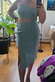 This dress is so flattering and beautiful! I am impressed by the material and quality of the construction. The cut out is in a flattering spot and the hemline and slit also fall in a very flattering place. - Shanda O.