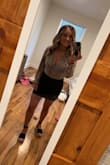 It is snug but it keeps it in place so I wouldn't size up. Sooo cute and it's very comfy! I paired it with the leopard bodysuit from here! - Taylor R.