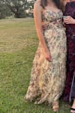 I loved wearing this dress to a black-tie optional wedding near the beach. It has a beautiful, elegant flow to it with a lovely color and was very flattering. Like other reviews have noted, you'll need to get it hemmed, but it was well worth the money in my opinion. One caution - the fit was a little tricky to navigate. I have an average-sized chest, but the cups still felt large, so I wore a sticky push-up bra which definitely helped. I also found that I had to tighten the bodice straps as much as I could tolerate keeping things in place/resulting in the most flattering appearance, though I definitely felt a little too 'sucked in' by the end of the night. I'm probably just not used to wearing a corset. I still would recommend this dress in a heartbeat, but I advise doing a trial run of fit/strap adjustment before you wear it out. - Dana L.