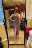 I wore this to a wedding and it was perfect! I originally got an XS but I couldn't get it zipped in the back and the material fit weird on my butt. But the small was perfect! The length was even just right without a hem which I wasn't expecting. Such a great color and super comfy. I love the style of the tulip skirt. I didn't feel it was flying up while dancing but we were inside so I'm not sure how it would be in other environments. - Alison L.