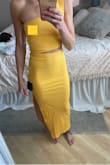 This dress is super flattering. Surprisingly the top/waist sit in the right spot on my short body, but I did need to hem the bottom (otherwise it was floor length). Slightly see through but easily fixed with ****** covers. I am going to keep it because it looks good on but the fabric quality is not the best, especially for the price. There were also very messy seams with loose strings hanging out that I had to trim. I doubt it will hold up for many wears, but we'll see! - Alyssa P.
