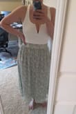 I bought this top to pair with a skirt and it was perfect! I have a large chest and was a little worried about how it would fit but it worked great! Definitely would recommend! - Hannah S.