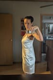 The waist of this dress is super loose, so the back of the dress just hangs straight down and is unflattering from the side. Overall, the back of the dress was cheap looking and I was disappointed in the stitching and elastic. An extra small might have fit better but the quality was lacking. - Bria N.