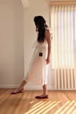 I was looking for a simple white dress for spring and summertime and this is it! It has an elastic waist so it can stretch and cinch you in. It's light and airy and I love the embroidery details! Like many white dresses it's a tad sheer so wear nude undergarments! - Beatriz K.