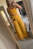 I love this outfit! Got a lot of compliments on it when I wore I out on the town. I have fairly long legs and could actually feel good in heels in this, which meant a lot to me.
I hold a little weight in my lower belly and that shows a bit, which isn't ideal & otherwise so cute. - Janna W.