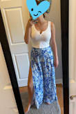 These pants are amazing!! They fit perfectly. I've worn them with a tank top and also over a swimsuit. The slit is super high, so if you wear them out you could pin them or just be cautious of the slit! - Lauren D.