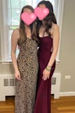 I bought this for a college formal and got SO many compliments. I'm not normally into leopard print but this looks so adorable on. It is longer on me than I would've expected so I'd recommend wearing it with higher heels or getting it hemmed. I wore an adhesive bra with it which worked great. - Emily O.